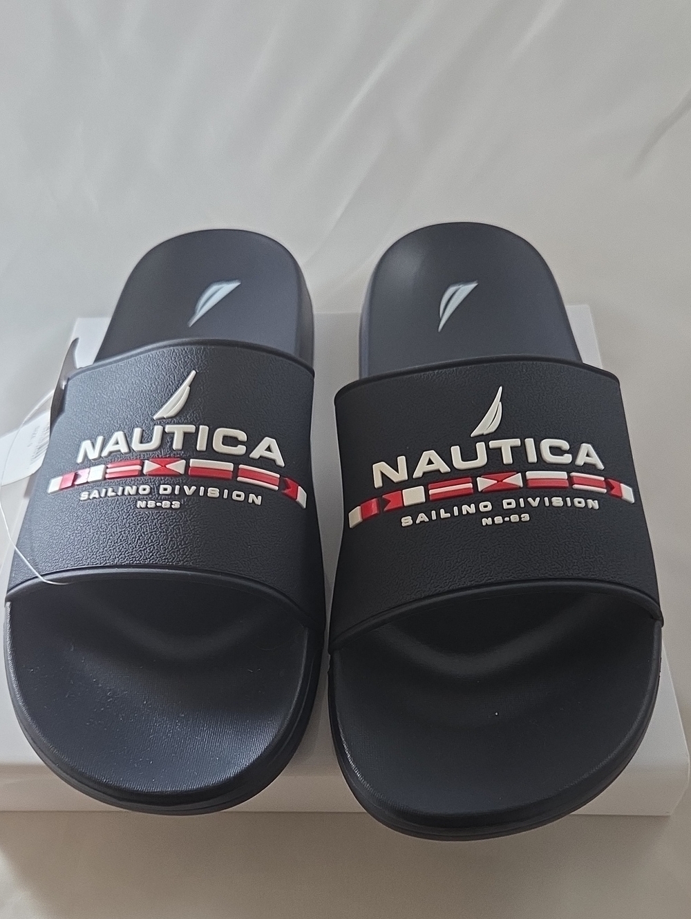 Nautica Black Slide Sandals with Red & White Sailing Division Logo